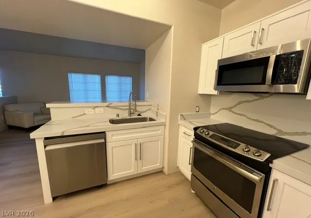 Listing Photo 3 - Condo for sale in building located at 2131 Hussium Hls St, Las Vegas, NV 89108 - Unit #208