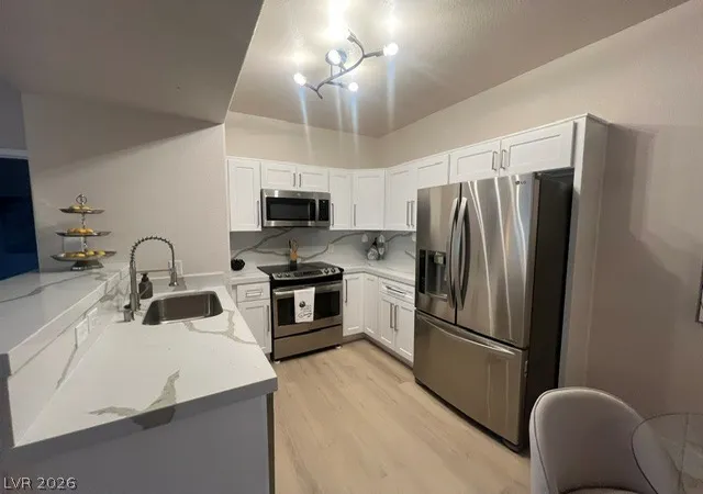 Listing Photo 4 - Condo for sale in building located at 2131 Hussium Hls St, Las Vegas, NV 89108 - Unit #208