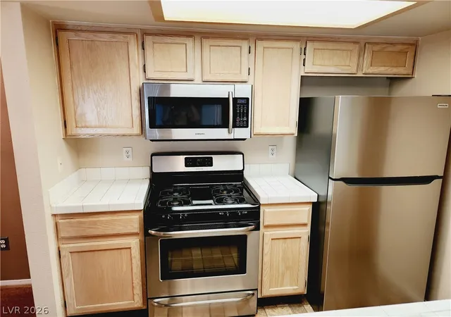 Listing Photo 1 - Condo for sale in building located at 7100 Pirates Cvs Rd, Las Vegas, NV 89145 - Unit #1059