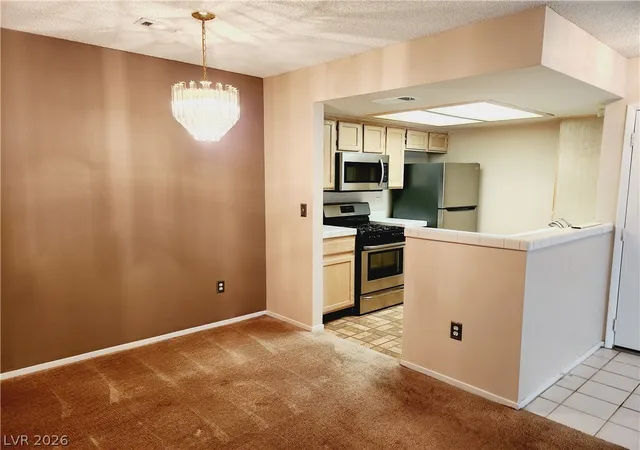 Listing Photo 5 - Condo for sale in building located at 7100 Pirates Cvs Rd, Las Vegas, NV 89145 - Unit #1059