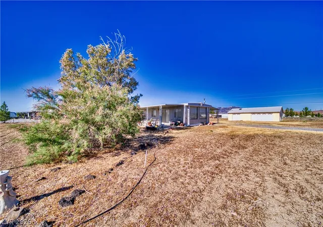 Photo 1 of Manufactured home for sale at 1260 Windy Ln, Pahrump, NV 89048 | MLS# 2824457 | Listing updated on 2026-10-07