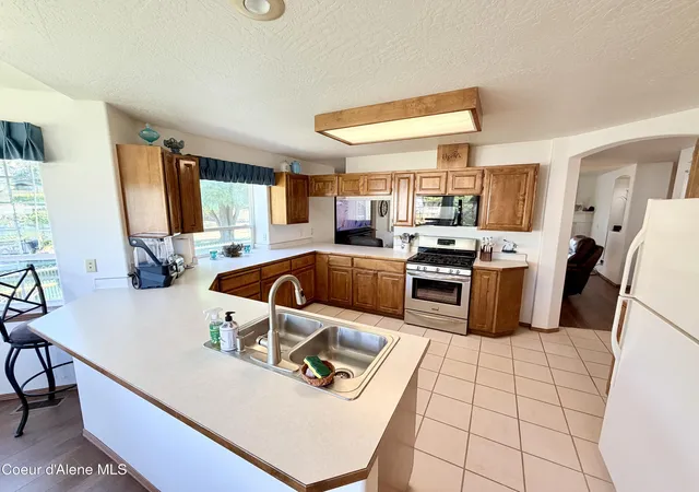 Photo 4 of Single family home for sale at 1020 W Woodlawn Dr, Hayden, ID 83835 | MLS# 26-8737 | Listing updated on 2026-09-14