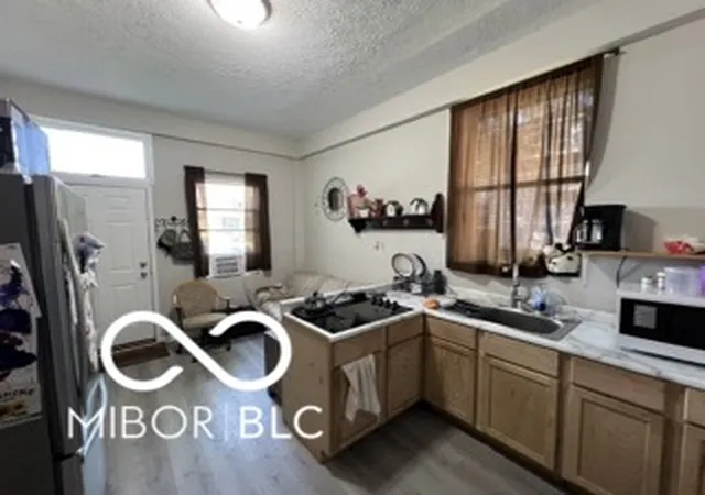 Photo 3 of Multi family home for sale at 120 W 5th St, Anderson, IN 46016 | MLS# 22049939 | Listing updated on 2026-10-19