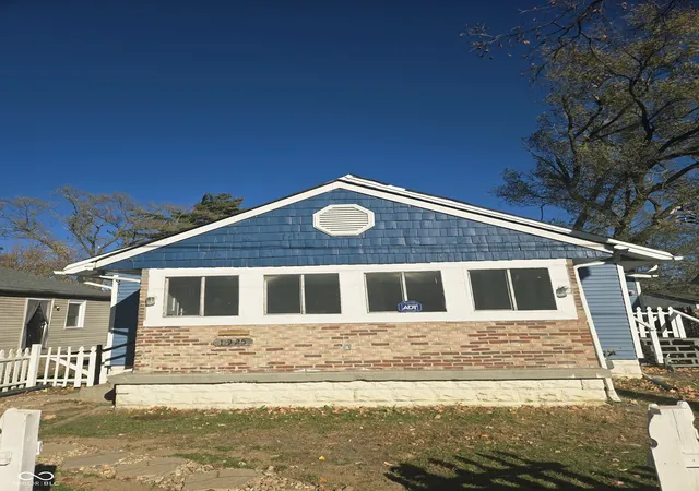 Photo 1 of Single family home for sale at 1925 N Oxford St, Indianapolis, IN 46218 | MLS# 22073681 | Listing updated on 2026-07-16