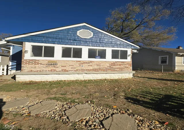 Photo 2 of Single family home for sale at 1925 N Oxford St, Indianapolis, IN 46218 | MLS# 22073681 | Listing updated on 2026-07-16