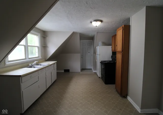 Photo 3 of House for sale at 907 W Main St, Muncie, IN 47305 | MLS# 22082358 | Listing updated on 2026-09-21