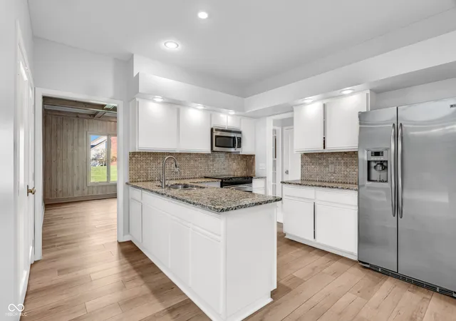 Photo 2 of Single family home for sale at 958 Tamarack Cir N Dr, Indianapolis, IN 46260 | MLS# 22083738 | Listing updated on 2026-09-21