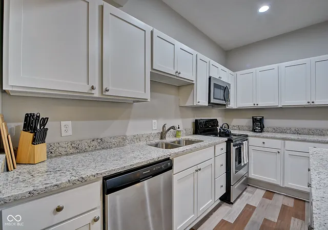 Photo 4 of Single family home for sale at 2450 Carrollton Ave, Indianapolis, IN 46205 | MLS# 22086393 | Listing updated on 2026-07-16