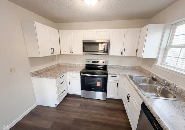 Photo 2 of Single family home for sale at 6654 Hazelhatch Dr, Indianapolis, IN 46268 | MLS# 22089486 | Listing updated on 2026-09-14