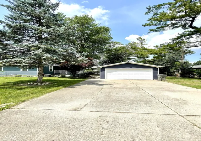 Photo 2 of Single family home for sale at 4950 E 18th Street, Indianapolis, IN 46218 | MLS# 22098968 | Listing updated on 2026-07-17