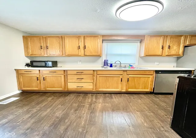 Photo 3 of Single family home for sale at 4950 E 18th Street, Indianapolis, IN 46218 | MLS# 22098968 | Listing updated on 2026-07-17