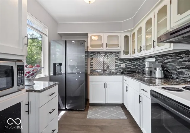Photo 3 of Single family home for sale at 9115 E Washington St, Indianapolis, IN 46229 | MLS# 22102107 | Listing updated on 2026-09-14