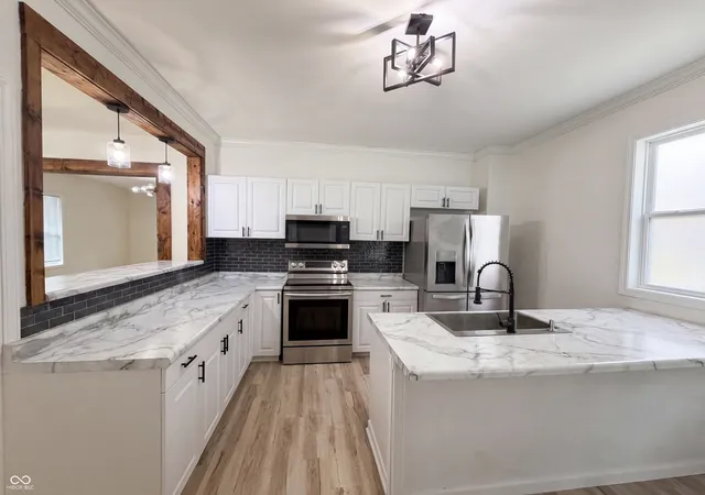Photo 2 of Single family home for sale at 37 N Sherman Dr, Indianapolis, IN 46201 | MLS# 22106478 | Listing updated on 2026-08-28