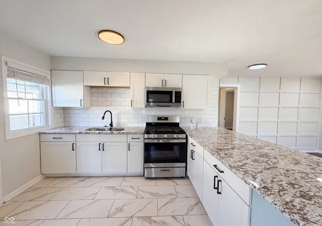 Photo 2 of Single family home for sale at 2310 Calhoun St, Indianapolis, IN 46203 | MLS# 22106514 | Listing updated on 2026-10-02