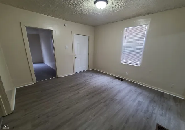 Photo 3 of Single family home for sale at 945 W Roache St, Indianapolis, IN 46208 | MLS# 22109238 | Listing updated on 2026-06-22