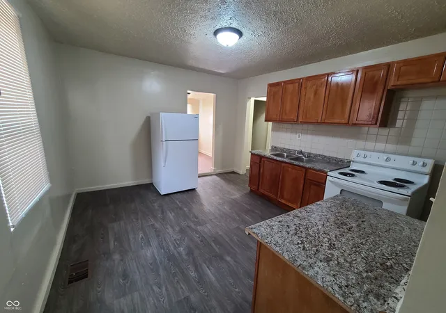 Photo 4 of Single family home for sale at 945 W Roache St, Indianapolis, IN 46208 | MLS# 22109238 | Listing updated on 2026-06-22