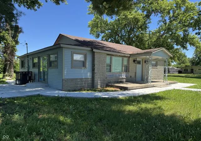 Photo 2 of Single family home for sale at 2702 Caroline Ave, Indianapolis, IN 46218 | MLS# 22109452 | Listing updated on 2026-07-21
