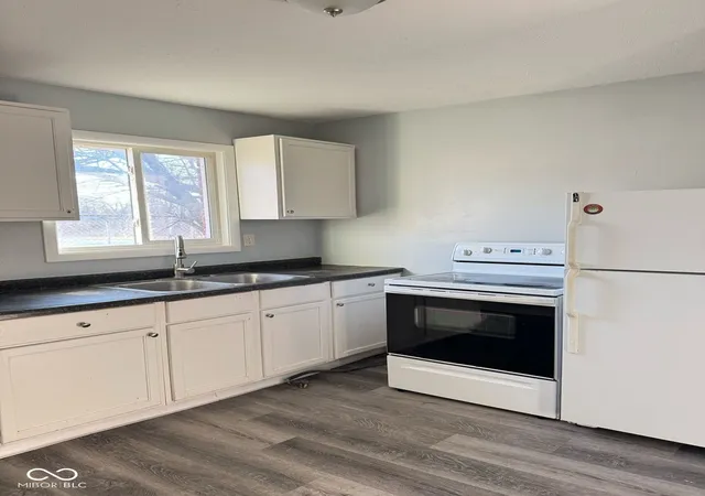 Photo 4 of Sale Pending at 2409 N Bolton Ave, Indianapolis, IN 46218 | MLS# 22109600 | Listing updated on 2026-08-17
