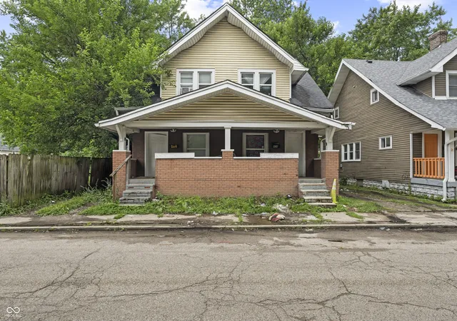 Photo 2 of Multi family home for sale at 402 N Parker Ave, Indianapolis, IN 46201 | MLS# 22109652 | Listing updated on 2026-08-20