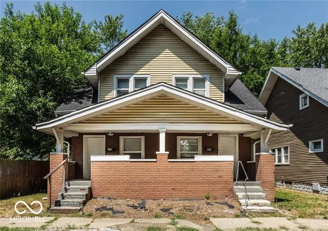 Photo 1 of Multi family home for sale at 402 N Parker Ave, Indianapolis, IN 46201 | MLS# 22109652 | Listing updated on 2026-08-20
