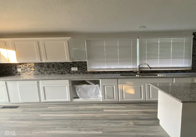 Photo 3 of Single family home for sale at 517 S Warman Ave, Indianapolis, IN 46222 | MLS# 22110416 | Listing updated on 2026-08-22