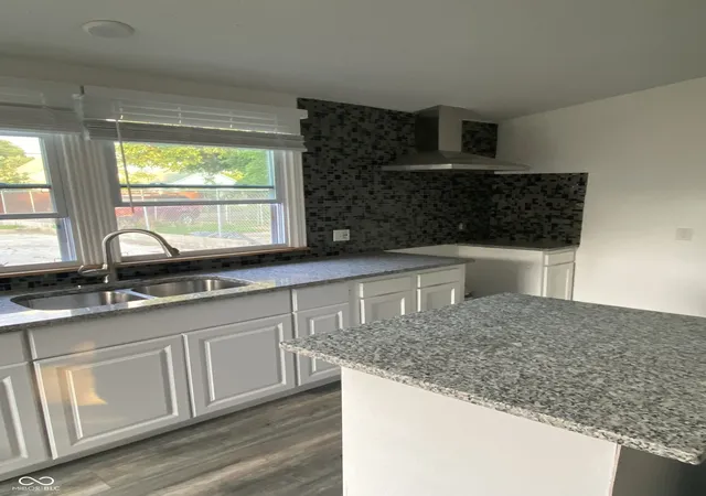 Photo 4 of Single family home for sale at 517 S Warman Ave, Indianapolis, IN 46222 | MLS# 22110416 | Listing updated on 2026-08-22