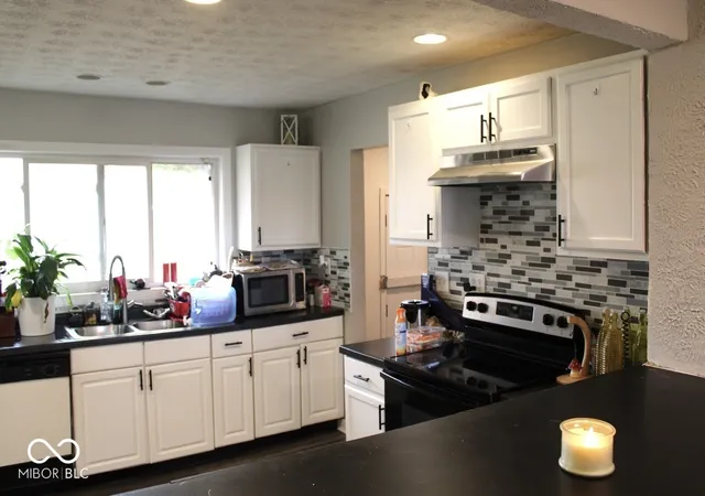 Photo 2 of Single family home for sale at 3103 N Arlington Ave, Indianapolis, IN 46218 | MLS# 22111290 | Listing updated on 2026-06-30