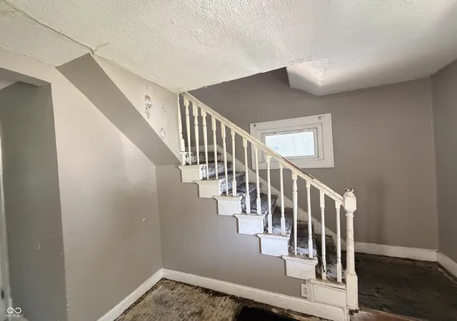 Photo 2 of Single family home for sale at 942 N Bosart Ave, Indianapolis, IN 46201 | MLS# 22111637 | Listing updated on 2026-09-30