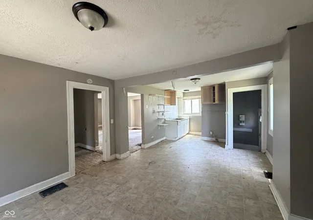 Photo 3 of Single family home for sale at 942 N Bosart Ave, Indianapolis, IN 46201 | MLS# 22111637 | Listing updated on 2026-09-30