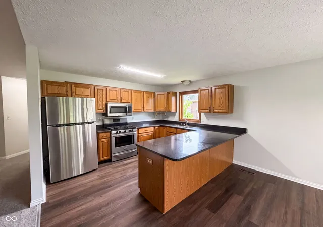2nd image of 1115 Texarkana Dr, Indianapolis, IN 46231 | MLS# 22112301