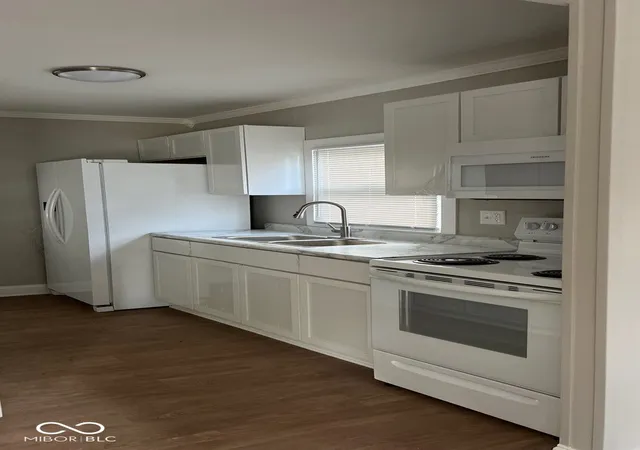 Photo 2 of House for sale at 1201 Wade St, Indianapolis, IN 46203 | MLS# 22114118 | Listing updated on 2026-10-01