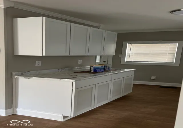 Photo 3 of House for sale at 1201 Wade St, Indianapolis, IN 46203 | MLS# 22114118 | Listing updated on 2026-10-01