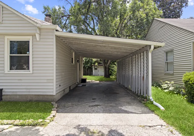 Photo 3 of Single family home for sale at 5429 E 19th Place, Indianapolis, IN 46218 | MLS# 22114370 | Listing updated on 2026-08-28