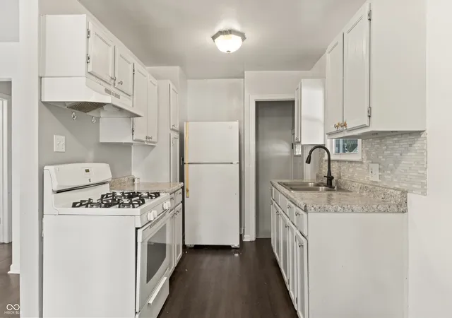 Photo 4 of Single family home for sale at 5429 E 19th Place, Indianapolis, IN 46218 | MLS# 22114370 | Listing updated on 2026-08-28