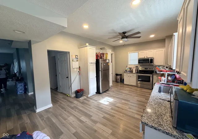 Photo 3 of Single family home for sale at 328 S Grand Ave, Indianapolis, IN 46219 | MLS# 22115135 | Listing updated on 2026-09-21