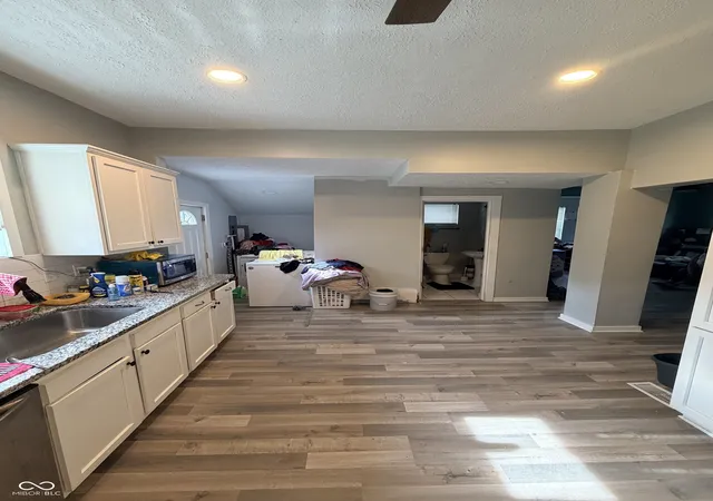 Photo 4 of Single family home for sale at 328 S Grand Ave, Indianapolis, IN 46219 | MLS# 22115135 | Listing updated on 2026-09-21