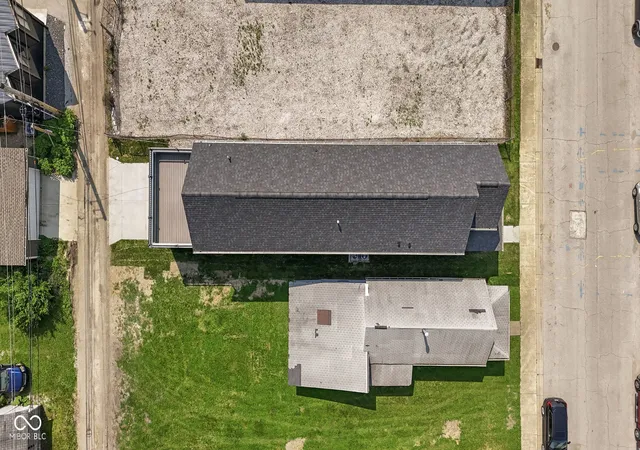 Photo 3 of Single family home for sale at 1405 Deloss St, Indianapolis, IN 46201 | MLS# 22115940 | Listing updated on 2026-08-28