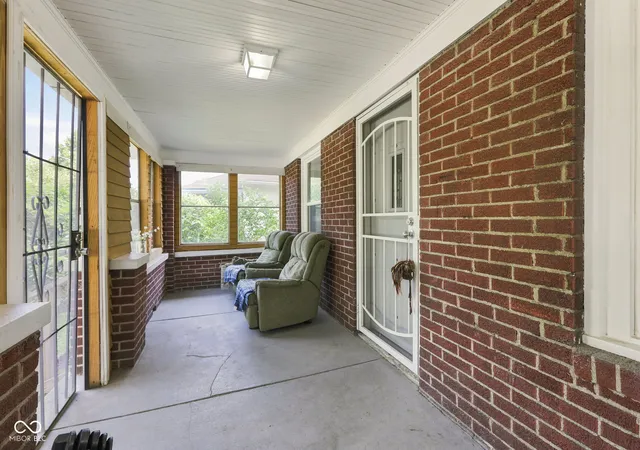 Photo 2 of Single family home for sale at 415 S Arlington Ave, Indianapolis, IN 46219 | MLS# 22116440 | Listing updated on 2026-09-30