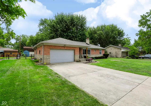 Photo 2 of Single family home for sale at 1021 N Mitchner Ave, Indianapolis, IN 46219 | MLS# 22116508 | Listing updated on 2026-08-31
