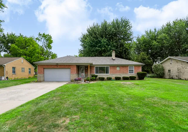 Photo 3 of Single family home for sale at 1021 N Mitchner Ave, Indianapolis, IN 46219 | MLS# 22116508 | Listing updated on 2026-08-31