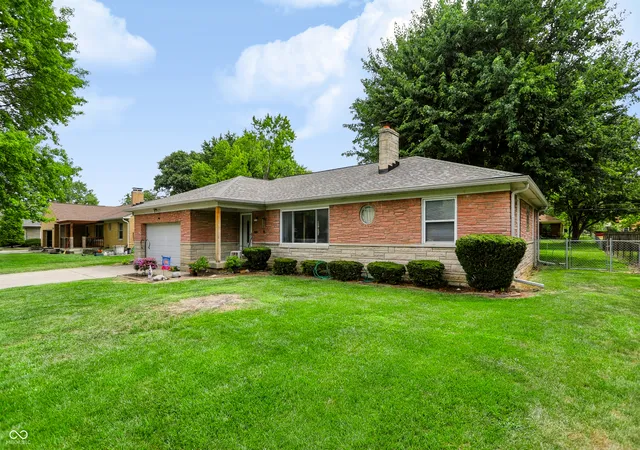 Photo 3 of Single family home for sale at 1021 N Mitchner Ave, Indianapolis, IN 46219 | MLS# 22116508 | Listing updated on 2026-08-31