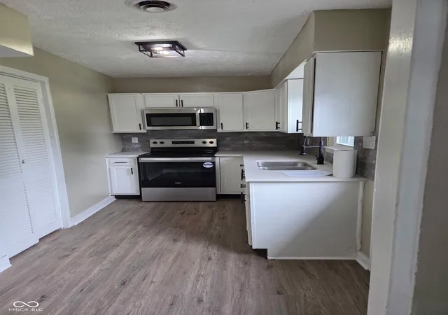 Photo 3 of Single family home for sale at 6174 Raleigh Dr, Indianapolis, IN 46219 | MLS# 22116868 | Listing updated on 2026-09-30