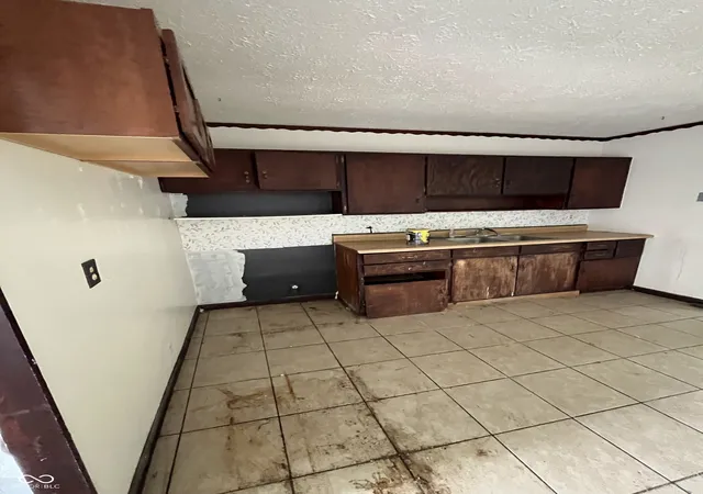 Photo 3 of Single family home for sale at 2594 Saint Paul St, Indianapolis, IN 46203 | MLS# 22116878 | Listing updated on 2026-08-19
