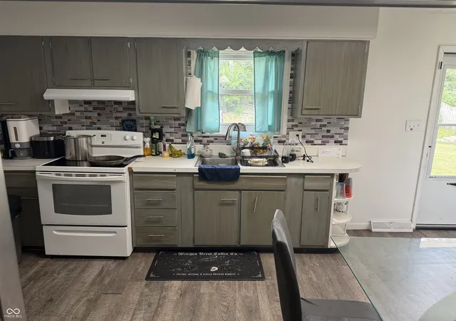 Photo 4 of Single family home for sale at 1205 Roseway Dr, Indianapolis, IN 46219 | MLS# 22116926 | Listing updated on 2026-07-31