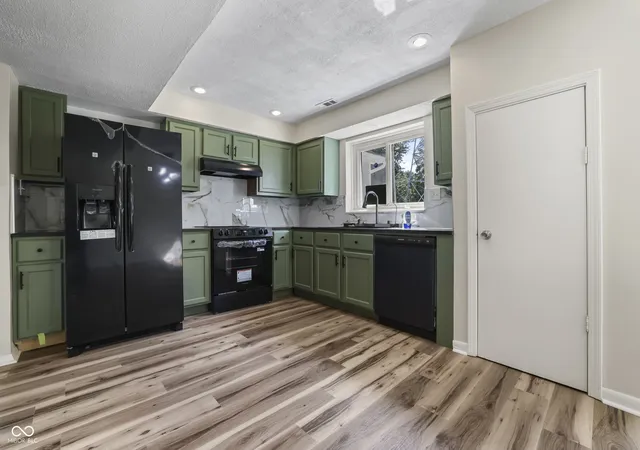 Photo 3 of Single family home for sale at 4404 Westbourne Dr, Indianapolis, IN 46205 | MLS# 22118053 | Listing updated on 2026-10-21