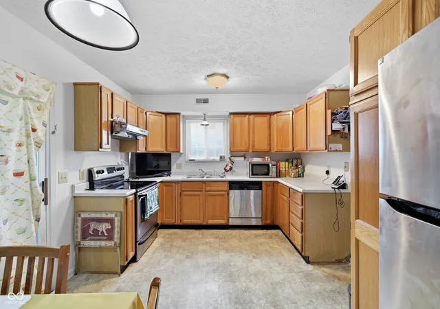 3rd image of 5153 Bird Branch Dr, Indianapolis, IN 46268 | MLS# 22118078
