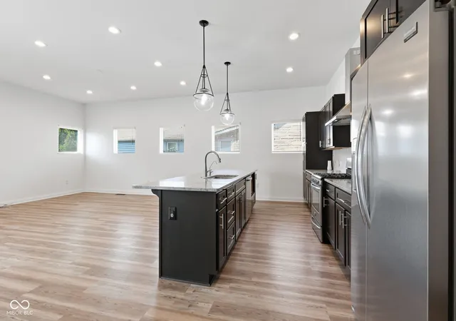 Photo 4 of Single family home for sale at 1230 Harlan St, Indianapolis, IN 46203 | MLS# 22118454 | Listing updated on 2026-09-26