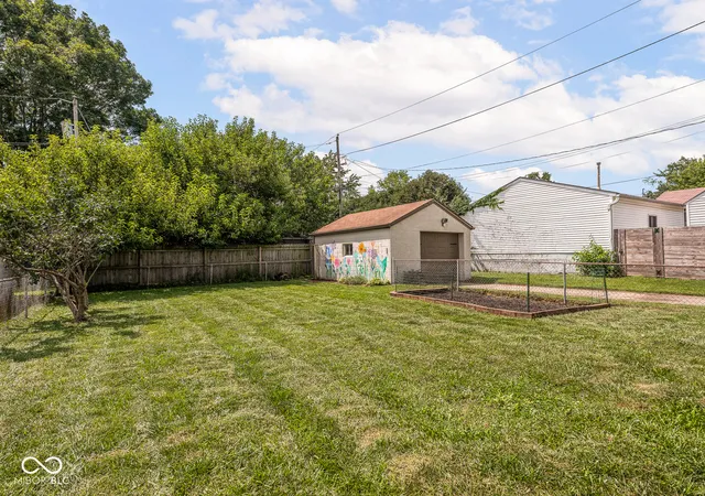 Photo 3 of Single family home for sale at 5419 Wayne Dr, Indianapolis, IN 46219 | MLS# 22118589 | Listing updated on 2026-10-07