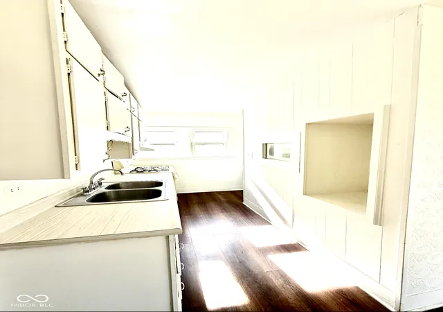 Photo 3 of Single family home for sale at 1852 N Audubon Rd, Indianapolis, IN 46218 | MLS# 22119151 | Listing updated on 2026-09-29