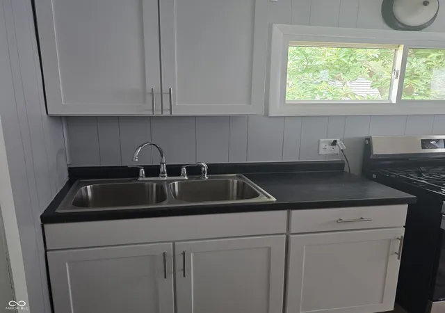 Photo 3 of Single family home for sale at 1305 S Belmont Ave, Indianapolis, IN 46221 | MLS# 22119786 | Listing updated on 2026-08-31